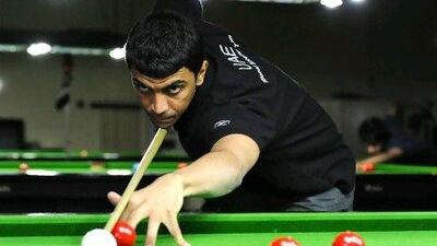 UAE Snooker Team player Mohamed Shehab pratices at Dubai Snooker Club.