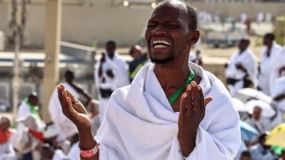 A pilgrim prays on Mount Arafat. AFP