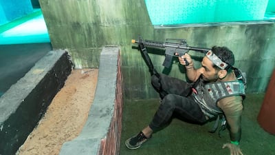 Shots are delivered through the StressX Belt, which sends adjustable levels of vibrations – and players can opt out of wearing the belt if they prefer to play without any sensation. Photo: Antonie Robertson / The National