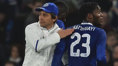 Chelsea manager Antonio Conte congratulates Michy Batshuayi at the final whistle. Glyn Kirk / AFP