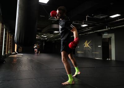 Mohammad Yahya training with a punch bag at TK Fitness in Dubai.