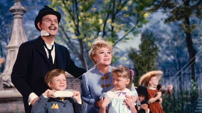 Actors David Tomlinson, Glynis Johns, Matthew Garber and Karen Dotrice in a scene from the movie Mary Poppins