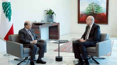 Former Prime Minister Najib Mikati (R) meets president Michel Aoun (L) in Beirut, Lebanon on August 05, 2021. (Photo by presidency)