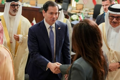 US Secretary of State Marco Rubio shakes hands with Lana Nusseibeh, Minister of State. AFP