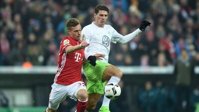 Mario Gomez, right, has been responsible for half of Wolfsburg's goals this season. Christof Stache / AFP