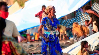 Ethiopian migrants who fled intense fighting in their homeland of Tigray, gather in the border reception center of Hamdiyet, in the eastern Sudanese state of Kasala. AFP