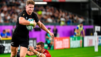 New Zealand's wing Jordie Barrett (L) breaks a tackle from Canada's full back Patrick Parfrey during the Japan 2019 Rugby World Cup Pool B match between New Zealand and Canada at the Oita Stadium in Oita. AFP