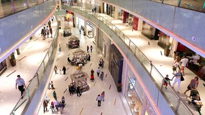 An information service, under consideration by the Department of Economic Development, is expected to benefit retailers and mall operators. Paulo Vecina / The National