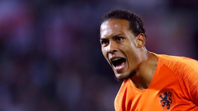 Virgil van Dijk of The Netherlands reacts to the goal scored by Quincy Promes during the UEFA Nations League semi-final match between the Netherlands and England. Getty Images