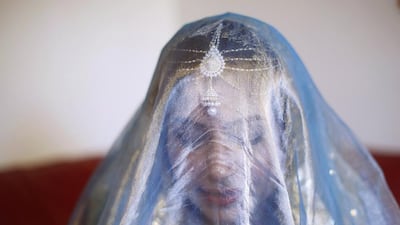 Sundas wears a Pakistani wedding veil ahead of her traditional Islamic wedding blessing held at home in Walthamstow, east London. Sundas started wearing a headscarf aged 18. She faced a lot of opposition, particularly from her mother, who doesn’t cover her head and didn’t like her strict interpretation of Islam. Her parents thought it would make her less attractive. Sundas says ‘I was determined to wear it nonetheless as I had a conviction in my heart that I wanted to please God instead of people. I don’t have such a strict interpretation of covering now, instead I focus more on modesty and moderate covering.’