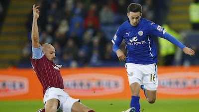 Aston Villa's Alan Hutton challenges Leicester City's Tom Lawrence during their Premier League match on Saturday. Darren Staples / Reuters