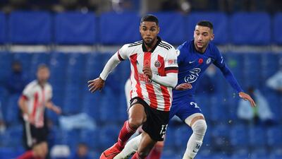Sheffield United's Max Lowe with Chelsea's Hakim Ziyech. Reuters