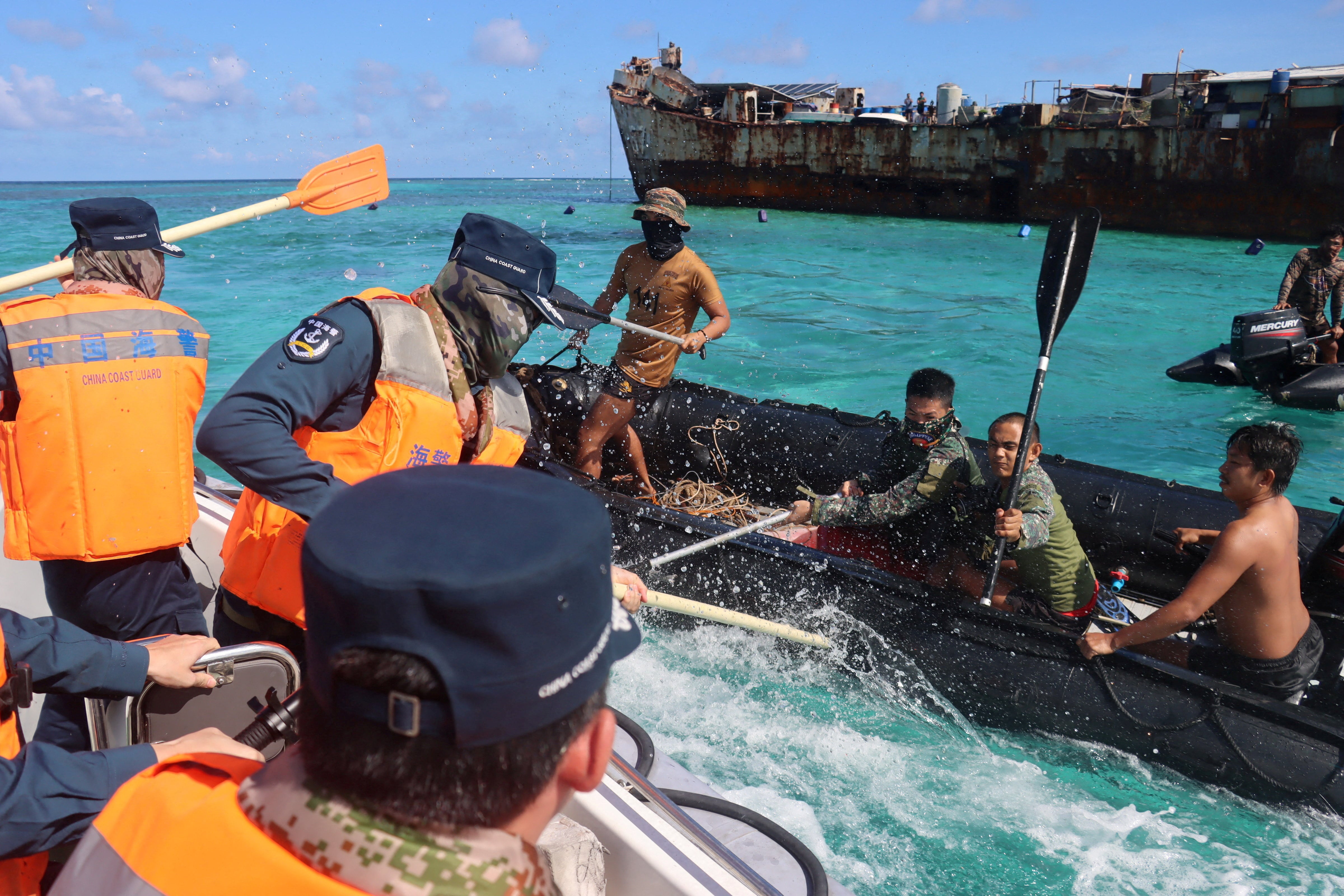 Image linked from the original feed: Pictures of the week: From clashes in the South China Sea to a penguin in Dubai