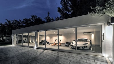 There's room for four full-sized cars in the showroom. All images courtesy LuxuryProperty.com