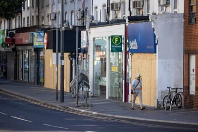 Boarded-up shops, secured for protection ahead of expected far-right disorder, in Walthamstow, London. Bloomberg