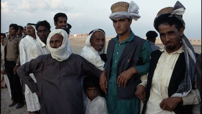 Spectators at a camel race attended by Sheikh Zayed, an event held to mark his fifth anniversary as ruler of Abu Dhabi. Bruno Barbey / Magnum Photos / arabianEye.com