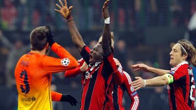 AC Milan's Sulley Muntari celebrates his goal against Barcelona in the Champions League.