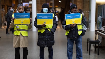 Workers at a 'welcome hub' for arriving Ukrainians in London. Getty Images