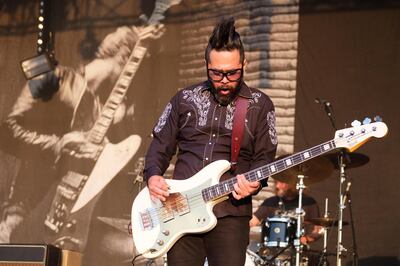Taka Hirose of Feeder performing at the Wychwood Festival in June. Alamy