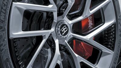 Some sturdy brakes visible behind the wheel rims.