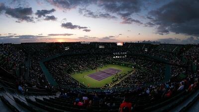 The sun sets on the stadium during the women's quarter-final round match between Venus Williams and Danielle Collins at the Miami Open. Erik S. Lesser / EPA