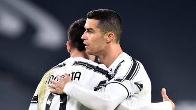 Juventus' Cristiano Ronaldo celebrates scoring their third goal with Alvaro Morata. Reuters