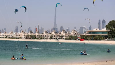 Kite surfers at a beach in Jumeriah, Dubai. Chris Whiteoak / The National