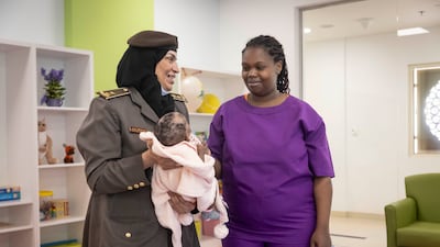 Ruth Waithera and baby Skula received help from staff at Al Awir Centre with their relocation back to Kenya. Antonie Robertson / The National