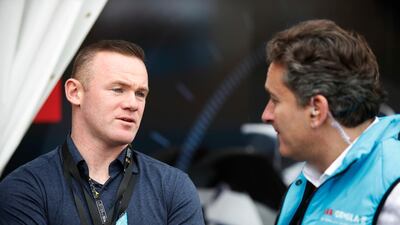 Wayne Rooney and Alejandro Agag, CEO of Formula E, chat during the race. Getty Images