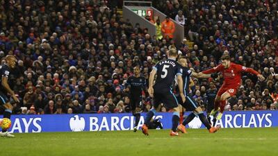 Football Soccer - Liverpool v Manchester City - Barclays Premier League - Anfield - 2/3/16Liverpool's Adam Lallana scores their first goalAction Images via Reuters / Lee SmithLivepicEDITORIAL USE ONLY. No use with unauthorized audio, video, data, fixture lists, club/league logos or "live" services. Online in-match use limited to 45 images, no video emulation. No use in betting, games or single club/league/player publications. Please contact your account representative for further details.