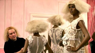 Furne One puts the finishing touches to his designs for Fashion Forward. Pawan Singh / The National