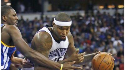 Sacramento Kings centre DeMarcus Cousins, right, has been difficult for management and the coaching staff to deal with. Observers say it may be time for the team to finally trade the talented player.