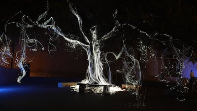 Maitha Hamdan's Breath of the Same Place drapes a lonely ghaf tree in luminescent wiring