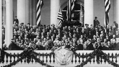 American president Calvin Coolidge takes the oath of office at his Inauguration ceremony, Washington, DC. William Howard Taft, Supreme Court Justice and former President, presides over the ceremony. March 4, 1924 Getty Images