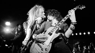 Guns N’ Roses, with original members Axl Rose, left, and Slash, perform in Los Angeles in 1985. Getty Images
