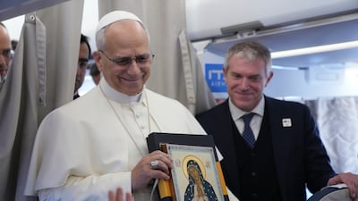 The Pope, seen here greeting reporters aboard the flight, is scheduled for a six-day trip to Turkey and Lebanon. AP