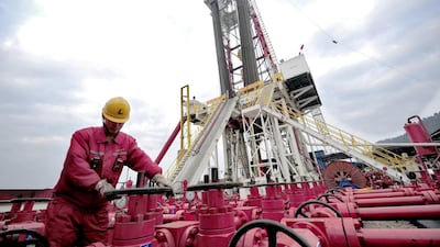 China explores for shale gas in the hope of replicating the energy bonanza in the United States. Above, a worker checks on the valves at a natural gas appraisal well in Sichuan. Reuters