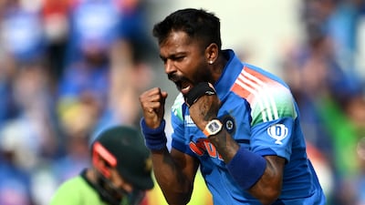 India bowler Hardik Pandya celebrates after taking the wicket of Pakistan's Saud Shakeel during the ICC Champions Trophy match at Dubai International Stadium on February 23, 2025. AFP
