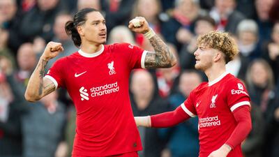 Darwin Nunez of Liverpool, left, celebrates after making it 3-1 against Burnley on Saturday. EPA