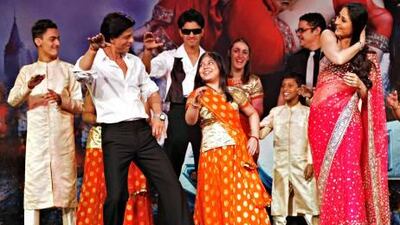 Shah Rukh Khan and Kareena Kapoor dance to the song Chammak Challo from their new movie Ra.One with students from the Rashid Paediatric Therapy Centre at a charity dinner at the Grand Hyatt Hotel.