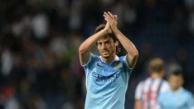 Manchester City's David Silva applauds fans after a Premier League victory in August. Oli Scarff / AFP / August 10, 2015