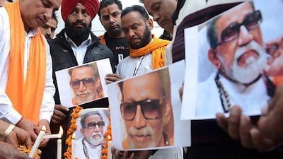 Members of the Indian Hindu nationalist Shiv Sena party light candles as they pay tribute to Bal Thackeray.
