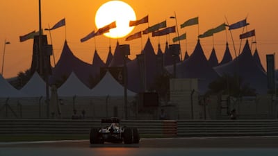 Mark Webber of Red Bull drives to pole position in qualifying yesterday for today’s Abu Dhabi Grand Prix. Webber and his teammate Sebastian Vettel have messages on their cars supporting Dubai’s Expo 2020 bid. Christopher Pike / The National