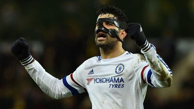 Chelsea's Brazilian-born Spanish striker Diego Costa celebrates at the end of the English Premier League football match between Norwich City and Chelsea at Carrow Road in Norwich, eastern England, on March 1, 2016. RESTRICTED TO EDITORIAL USE. No use with unauthorized audio, video, data, fixture lists, club/league logos or 'live' services. Online in-match use limited to 75 images, no video emulation. No use in betting, games or single club/league/player publications. / AFP / BEN STANSALL / RESTRICTED TO EDITORIAL USE. No use with unauthorized audio, video, data, fixture lists, club/league logos or 'live' services. Online in-match use limited to 75 images, no video emulation. No use in betting, games or single club/league/player publications.