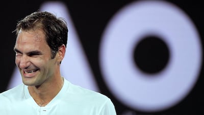 Roger Federer of Switzerland reacts after winning his third round match against Richard Gasquet of France at the Australian Open. Tracey Nearmy / EPA