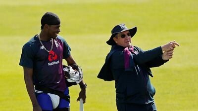 England head coach Trevor Bayliss gives bowler Jofra Archer batting tips. Reuters
