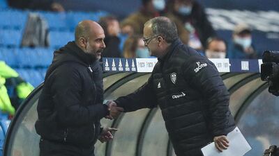 Manchester Cuty manager Pep Guardiola and Leeds coach Marcelo Bielsa at their October meeting. Getty