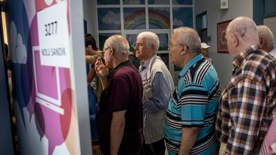 People line up to cast their votes in Istanbul in the country's parliamentary and presidential election. Getty