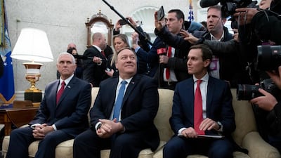 US Vice President Mike Pence (left), US Secretary of State Mike Pompeo (centre) and Senior Advisor to US President Trump Jared Kushner (right) sit beside members of the news media in the Oval Office during the meeting of Donald Trump and Benjamin Netanyahu. EPA