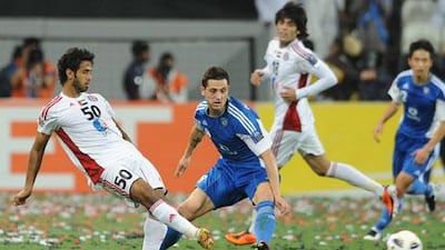 Al Jazira, in white, and the other league teams drew accolades for their stadiums and their youth programs from the Asian Football Confederation.